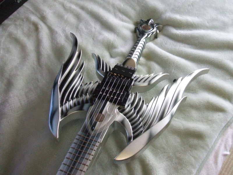 Illustration for article titled Angel Sword Guitar Plays Iron Maiden Songs, Slays Teen Pop Stars